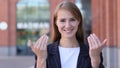 Inviting Gesture by Young Business Woman