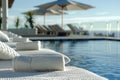 Inviting poolside scene with a woven sunbed and plush towel