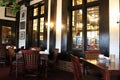 Inviting scene with dining chairs and tables ready for guests, Red Coach Inn, Niagara Fall, New York, 2019