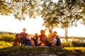 Serene Lakeside Picnic at Sunset with Friends and Family Royalty Free Stock Photo