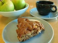 Slice of healthy, fresh-baked apple cake with coffee Royalty Free Stock Photo