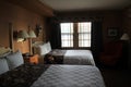 Inviting suite with comfortable beds and decorations, The Sagamore Resort, Bolton Landing, NY, 2016