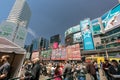 Inviting view of many people at dundas square, walking, sitting, relaxing and enjoying their weekend time Royalty Free Stock Photo
