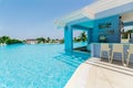 inviting view of two level swimming pool, bar and grounds at Grand Aston hotel, resort