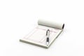 Invoice book which open blank page with pen.