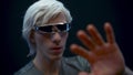 Involved man touching considering VR technologies. User exploring metaverse