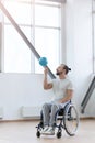 Involved young handicapped holding the ball in the gym