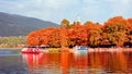 ioannina or giannena in autumn sesaon lake trees boats colors blue sky greece Royalty Free Stock Photo