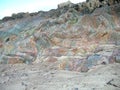 Multi coloured rocks of the Island Iona, Scotland, UK. Royalty Free Stock Photo