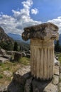 Ionic order column in the archaeological site of Delphi in Greece Royalty Free Stock Photo