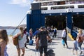 Ios - Cyclades - Greece - October 3 2018 : Backpackers board the inter island ferry on the Greek island of Ios.