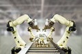 Iot industry 4.0 technology concept.Smart factory using trending automation robotic arms with empty conveyor belt in operation lin