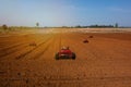 Iot, internet of things, agriculture concepts, Farmer use automatic robot assistant to work in the farm , to detect the weed ,spra