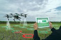 Iot smart agriculture industry 4.0 concept, drone in precision farm use for spray a water, fertilizer or chemical to the field, Royalty Free Stock Photo