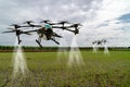 Iot smart agriculture industry 4.0 concept, drone in precision farm use for spray a water, fertilizer or chemical to the field, Royalty Free Stock Photo