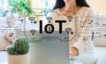 IoT theme with woman using her laptop Royalty Free Stock Photo