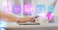 IoT theme with woman using a laptop Royalty Free Stock Photo