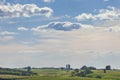 Iowa farm and fields under a beautiful cloudscape on a summer afternoon Royalty Free Stock Photo