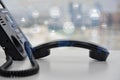 IP Phone double exposure with blue LED world map and business icon of VOIP human and for communication concept