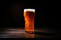 an ipa beer glass shadowed on a dark table Royalty Free Stock Photo