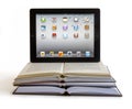 Ipad 3 on books Royalty Free Stock Photo