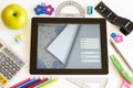 Ipad 3 with maps and school accesories Royalty Free Stock Photo