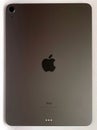 The iPad Air 2020 tablet in black color lies on a branded box on a white isolated background. Back side view of the tablet Royalty Free Stock Photo