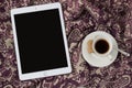 IPad Apple tablet with a cup of coffee. Elegant and cozy feminine background, concept for advertisement