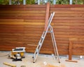 Ipe wood fence installation carpenter table saw Royalty Free Stock Photo