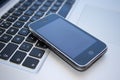 IPhone 3GS and Macbook Pro Royalty Free Stock Photo