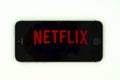 IPhone with Netflix screen display