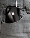 Iphone in a pocket of jeans.