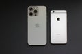 iPhone 15 Pro Max and iPhone 6 side-by-side Royalty Free Stock Photo