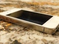 IPhone 4S laying on a classy granite countertop