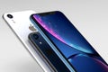 3 iPhone XR blue. silver and Space Grey smart phones