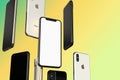 IPhone XS Gold, Silver and Space Grey smartphones, floating in air, white screen Royalty Free Stock Photo