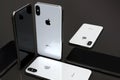 IPhone XS Silver smartphones, arranged in mosaic composition