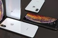 IPhone XS Silver smartphones, arranged in mosaic composition