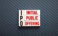 IPO - acronym from wooden blocks with letters, Initial Public Offering IPO concept, white background Royalty Free Stock Photo