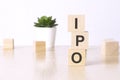 IPO - Initial Public Offering - text on wooden cubes on a white background Royalty Free Stock Photo