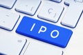 IPO word on blue computer keyboard Royalty Free Stock Photo