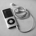 IPod Nano with Earpods in Black and White Royalty Free Stock Photo