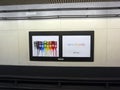 Ipod Nano nano-chromatic ad on wall in BART Powell street subway