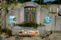 Chinese grave tombstone with photograph and painted artistic tiles Ipoh Malaysia