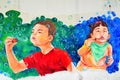 Ipoh Street Art: Two children blowing bubbles Royalty Free Stock Photo