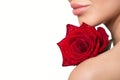 Ips, shoulder, part of the face of a woman. Red rose in her hands. Skin care concept. White background. the beauty Royalty Free Stock Photo