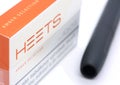 Iqos electronic cigarette with a pack of Heets