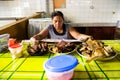 Image of woman cook. Street food in open market in Peruvian jungle city.