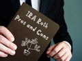 IRA Roth Pros and Cons sign on the piece of paper Royalty Free Stock Photo