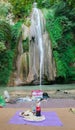 Sari, Iran - 18 July 2017: Waterfall at north of Iran, with iranian taking a swim with clothes and preparing barbacoe and iranian Royalty Free Stock Photo